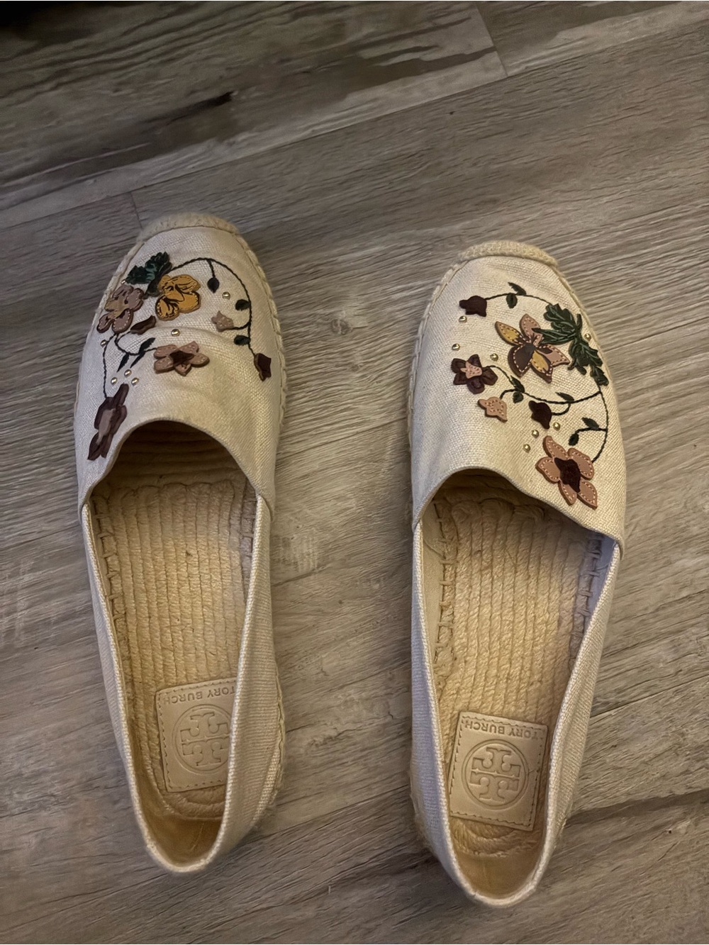 Tory Burch Cream Espadrille Slip-On with Multicolor Floral Embroidery.